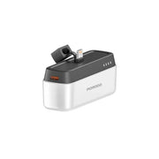 A Porodo brand power bank with a white and black color scheme, featuring a Lightning connector for Apple devices.