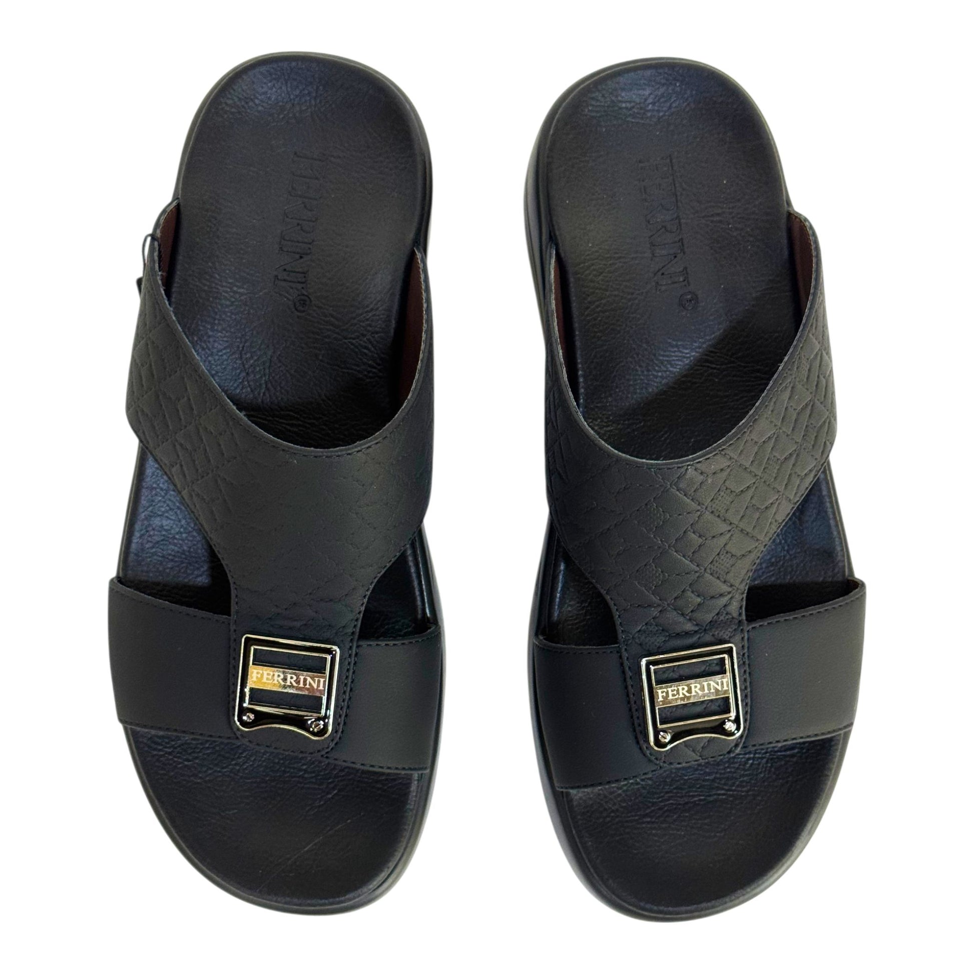 Pair of black sandals with a brand logo on a white background